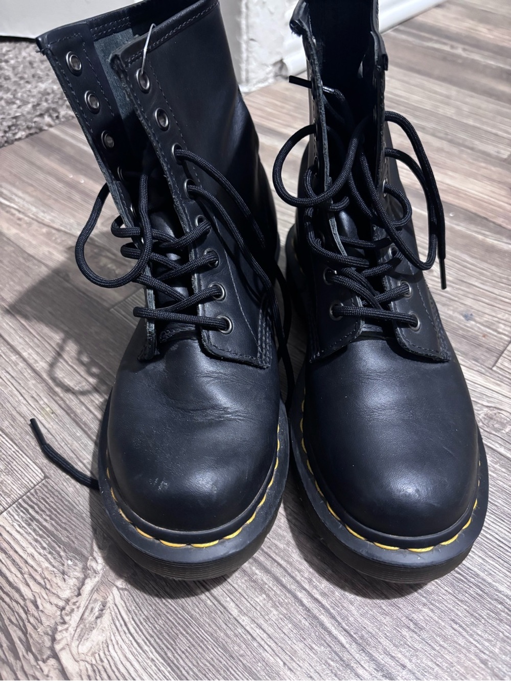 Dr. Martens Black Leather Combat Boots with Yellow Stitching